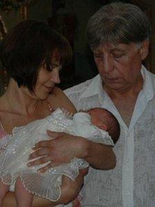 Yuri Pelenski with his wife Olya and their granddaughter