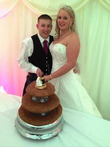 Andrew and Kirsty Stewart with cake