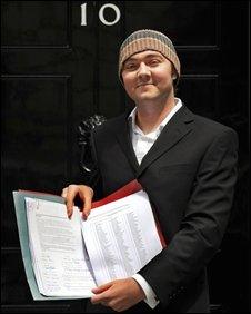 Adrian Sudbury preparing to hand over his petition at 10 Downing Street last month