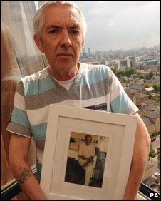 Alan Rees with a picture of Raymond Cutkelvin