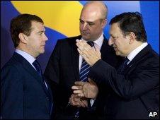 Russian President Dmitry Medvedev, left, Sweden's Prime Minister Fredrik Reinfeldt and EU Commission President Jose Manuel Barroso, right