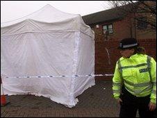 A police officer at the scene of the stabbing in Bow, east London