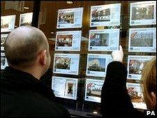 Looking in an estate agent's window