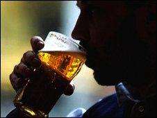 Man drinking a pint of lager