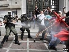 Greek riot policemen clash with protestors in front of the National Bank of Greece (5/5/10)