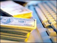 Money and computer keyboard