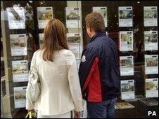 Looking in an estate agent's window