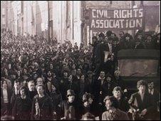 Civil rights campaigners march through Londonderry on Bloody Sunday