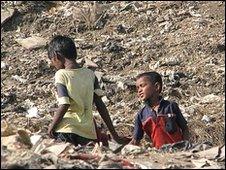 Child on rubbish heap in Mumbai