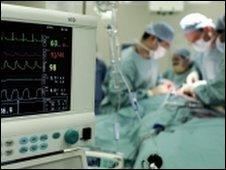 Doctors in an operating theatre