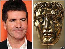 Simon Cowell with Bafta mask