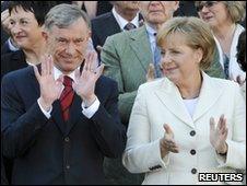 German President Horst Koehler and German Chancellor Angela Merkel (file pic, May 2009)