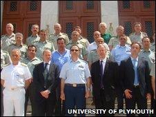 Professor Simon Payne and Professor David Wheeler with members of the Greek Military