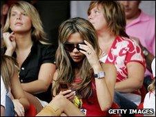 Victoria Beckham on mobile phone