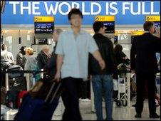 Passengers at Heathrow airport's Terminal 5, on 21 April 2010.