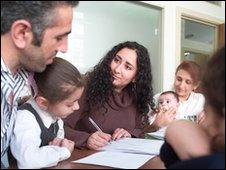 A family receiving legal advice