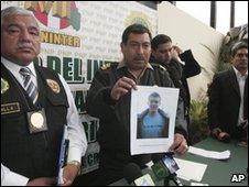 Peruvian police show a picture of suspect Joran van der Sloot at a press conference, 2 June 2010