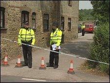 Police officers at the scene of the incident in Rogate, Chichester