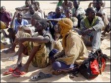 A group of captured migrants discovered walking for four days in the Sahara desert on a clandestine journey from Niger into Libya (Archive 2009)