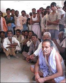 Villagers meet at Dihayla village in the sanctuary area