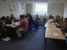 Immigrants taking an English class