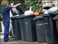 Man putting out the rubbish