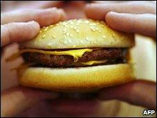 Man eating burger