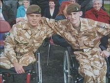 Pte Ben Bainbridge [right] with an injured colleague