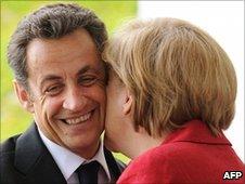 French President Nicolas Sarkozy and German Chancellor Angela Merkel