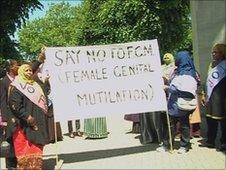 Protesters with banner