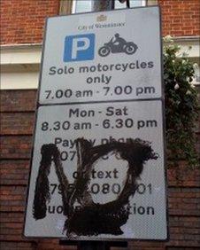 Vandalised sign