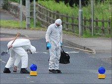 Forensics officers at the scene of the alert