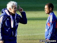 France Manager Raymond Domenech (left) and Captain Patrice Evra talk on 20 June