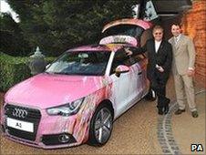 Sir Elton John and David Furnish (right) with Audi A1 - Audi/PA