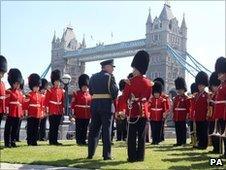 Band of the Coldstream Guards in front of Tower Bridge in London