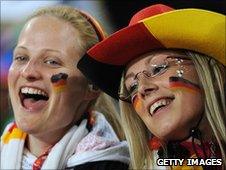 German football fans cheer duirng the the Group D, first round. 13 June 2010