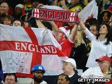 England fans cheer before the Group C first round 2010 World Cup football match England v USA.