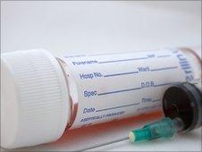 Blood test vial and syringe