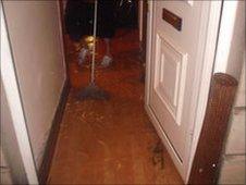 Mopping up at Bryngwyn Road, Dafen, Llanelli after flooding