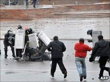 Kyrgyz opposition supporters clash with police in Bishkek, 7 April 2010