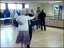 elderly couple dancing