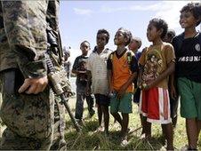US soldiers visit East Timor, meet young boys, June 2010