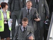 England team arrive home