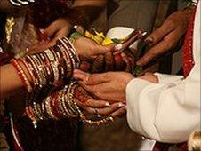 Bride and groom's hands