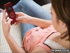 Teenage girl with mobile phone (file pic)