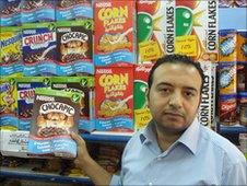 Hani Asri in his supermarket