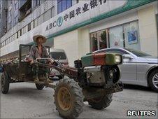 Agbank tractor and car