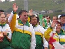 Dave Dorey leading the Guernsey Island Games team in the opening ceremony in the 2005 Games in Shetland