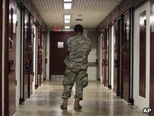 A US guard stands in a corridor in Guantanamo Bay prison (file image)