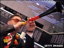 Frankfurt stock exchange trader blowing vuvuzela during World Cup semi-final
